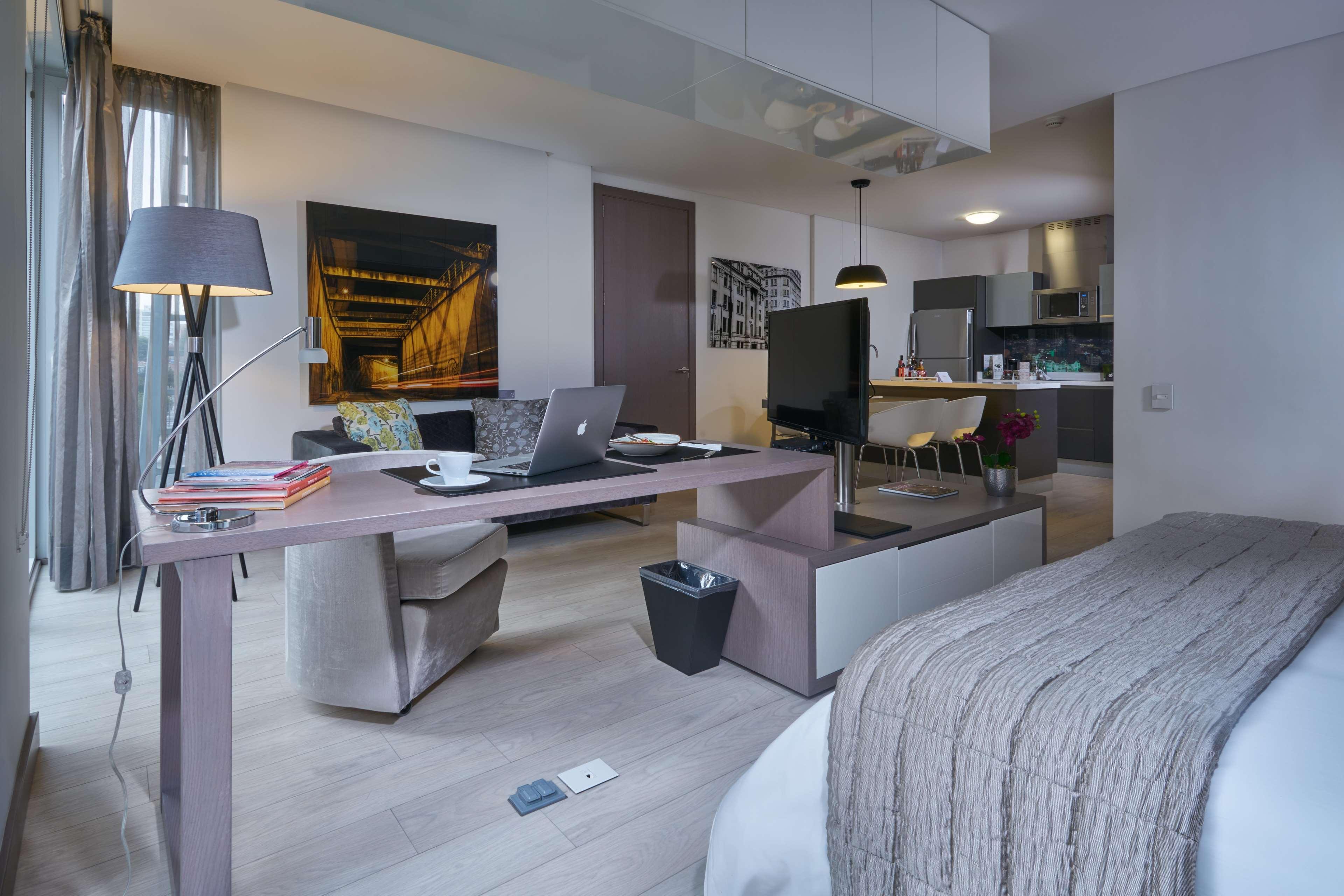 Hotel 100 Luxury Suites By Preferred Богота Экстерьер фото A typical studio apartment