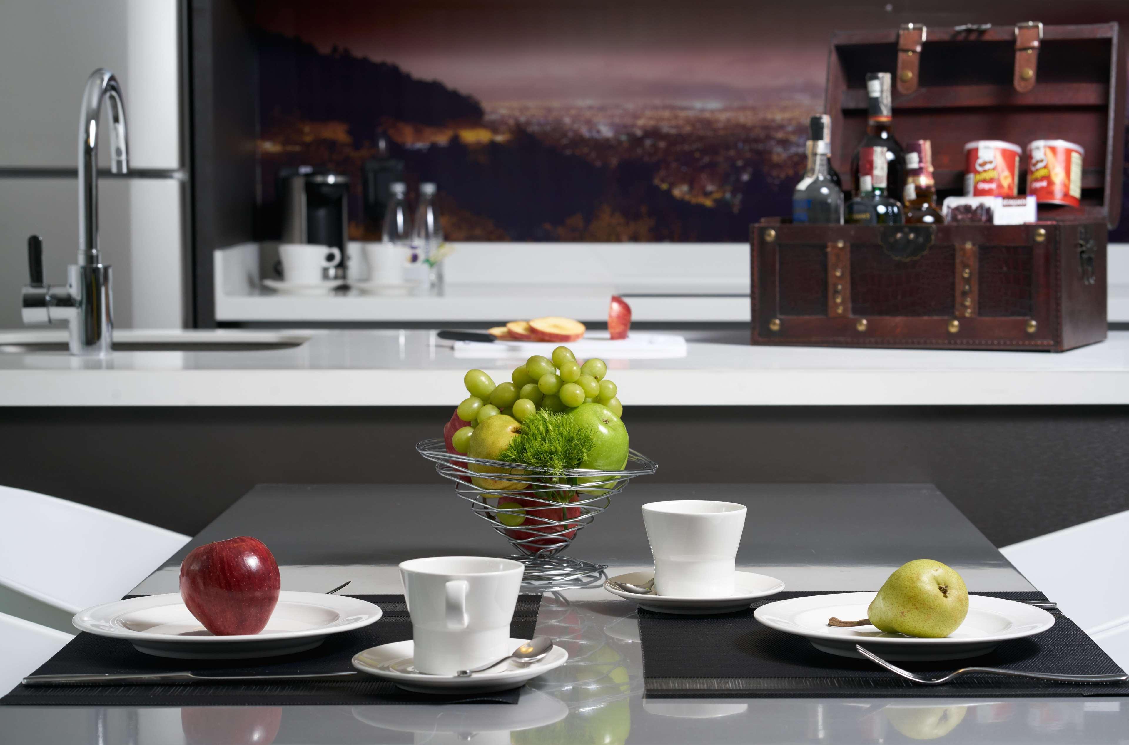 Hotel 100 Luxury Suites By Preferred Богота Экстерьер фото A kitchen with a built-in coffee machine