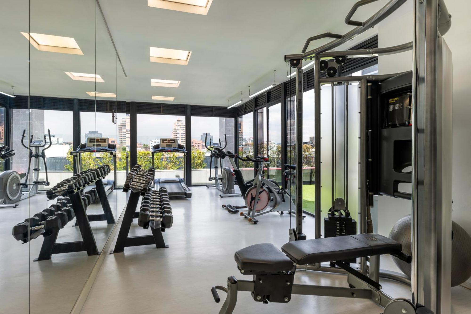 Hotel 100 Luxury Suites By Preferred Богота Экстерьер фото The gym at the 100 East 53rd Street building